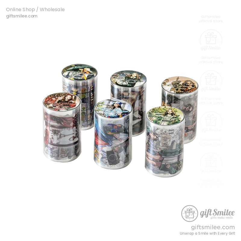 Cylindrical packaging of scrapbook stickers featuring Parisian chic art, ideal for gifting and crafting