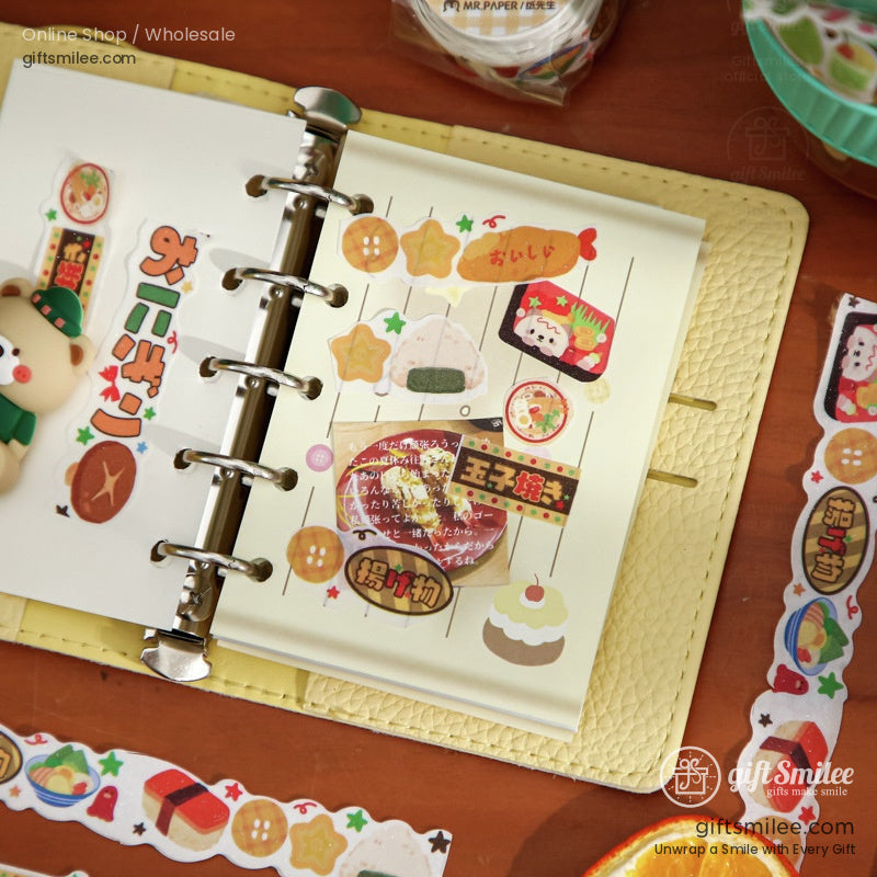 Planner with vibrant Japanese-themed washi tape designs used as decoration