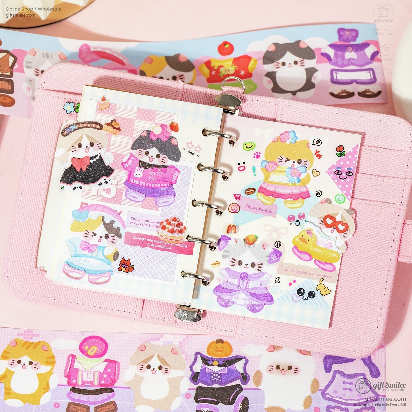 Decorated journal page with kawaii cat stickers and washi tape accents