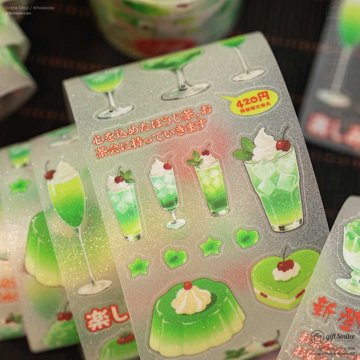 Close-up of mint-green soda and jelly dessert design on glitter washi tape