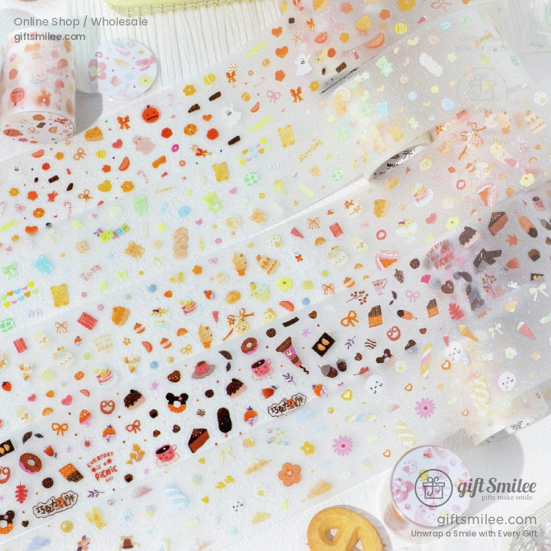 Close-up of kawaii food-themed washi tape with donuts, chocolates, and pastel sweets