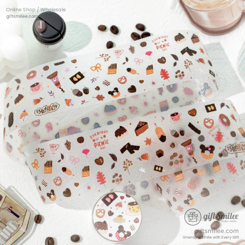 Kawaii washi tape roll with vibrant food-themed patterns, perfect for journaling