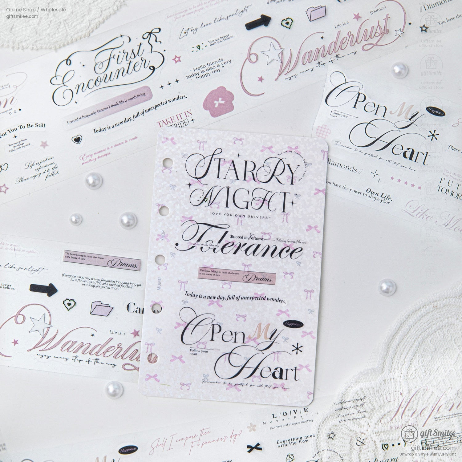A pastel-themed journal decorated with motivational and vintage-style washi tape