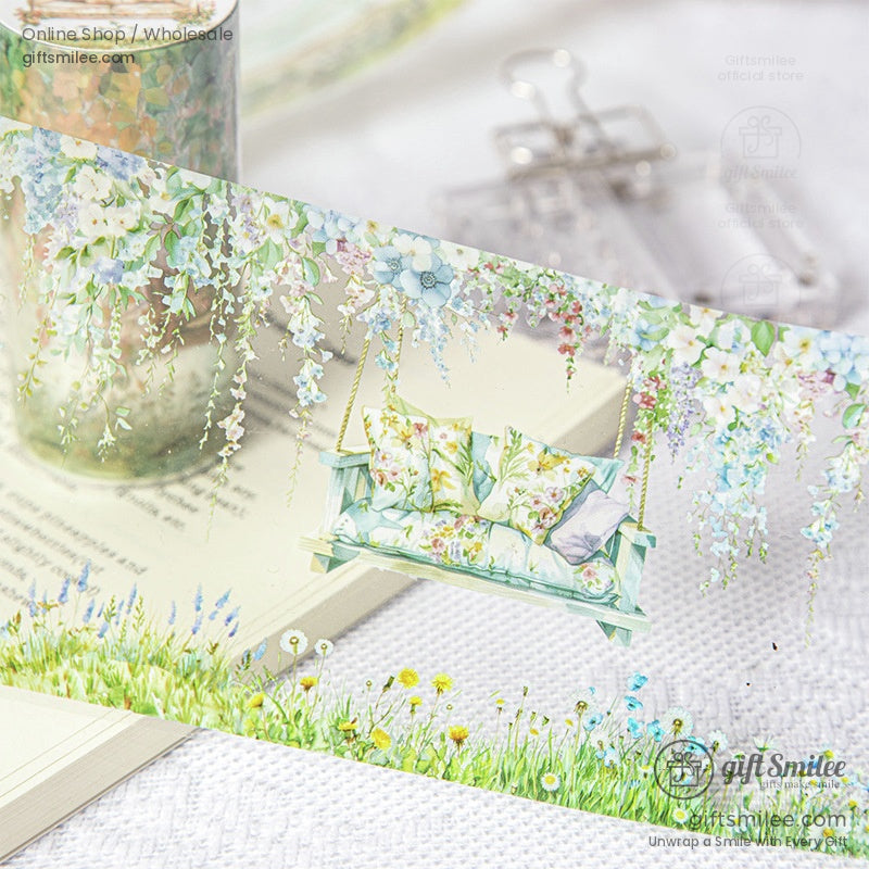 Washi tape roll featuring a cozy floral swing with blossoming flowers