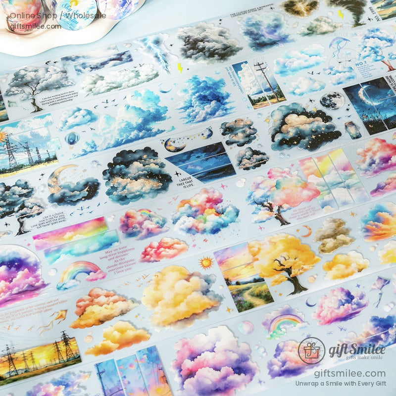 A detailed view of sky-themed washi tapes with dreamy clouds and rainbows on a soft blue background