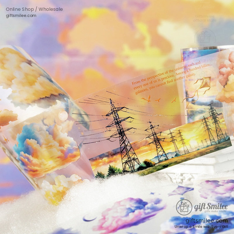 A detailed view of sky-themed washi tapes with dreamy clouds and rainbows on a soft blue background