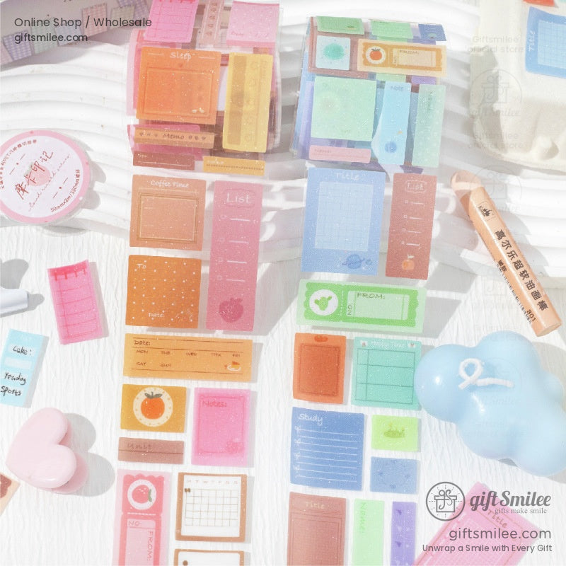 Close-up of colorful washi tape rolls with decorative designs for journaling and crafting