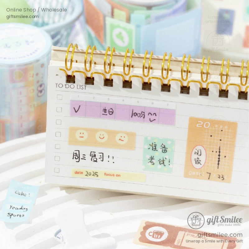 Creative journaling setup featuring decorative washi tape designs and planner stickers