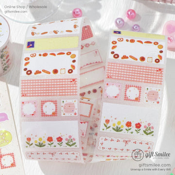 Close-up of bakery-themed washi tape with bread and gingham designs