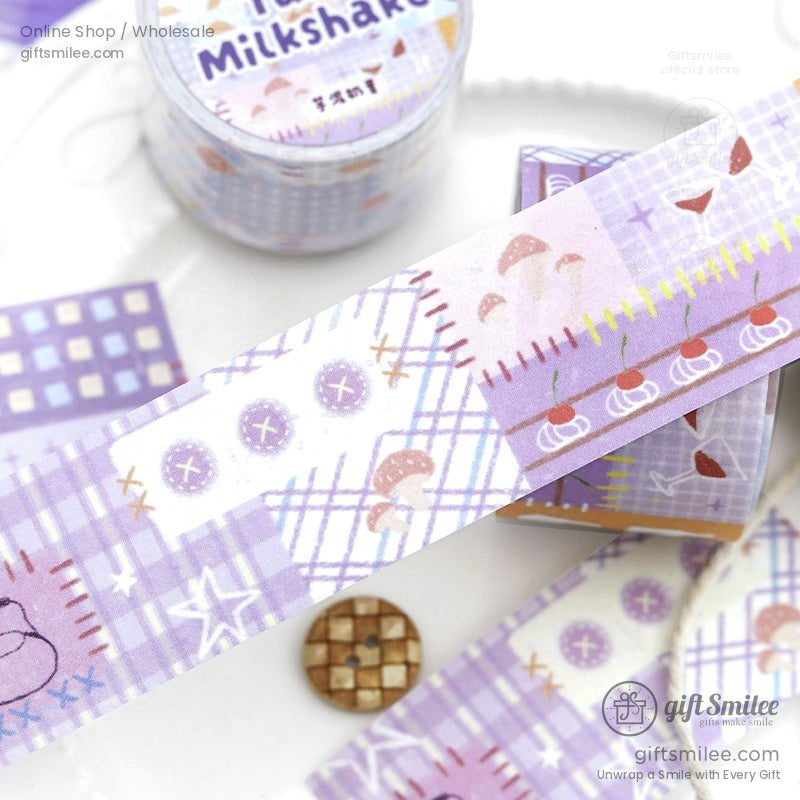 Purple washi tape with cherries, plaid patterns, and whimsical designs, styled with a wooden button