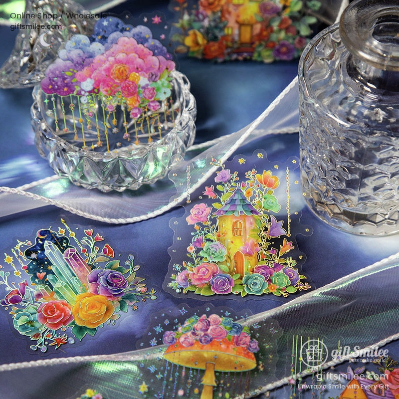 Watercolor stickers displayed with enchanting gardens, crystal houses, and floral elements.