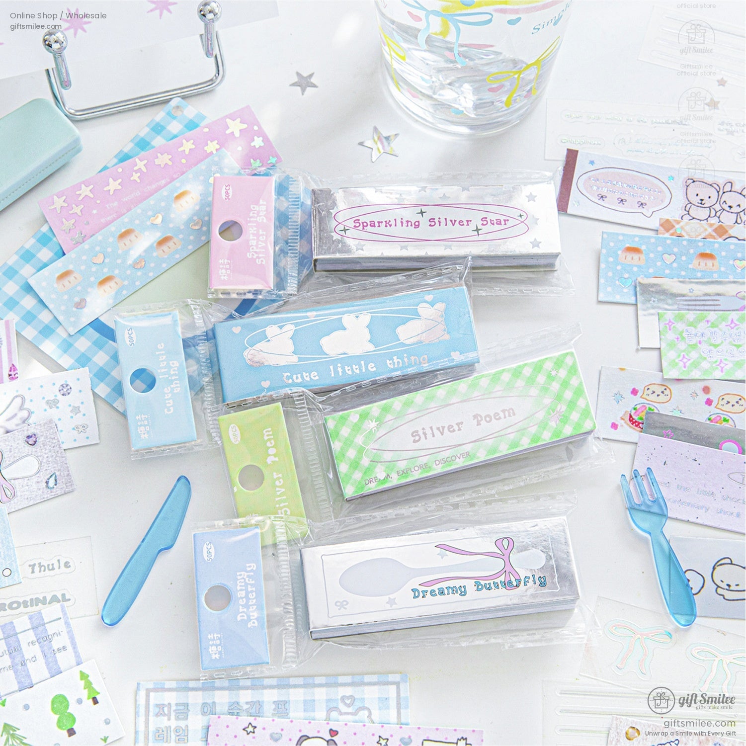 Multiple sticker sets displayed, featuring pastel colors and holographic designs like stars and cute patterns