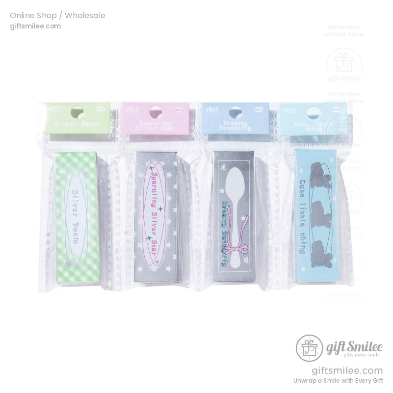 Packaged holographic sticker sets in pastel designs ready for journaling and crafting