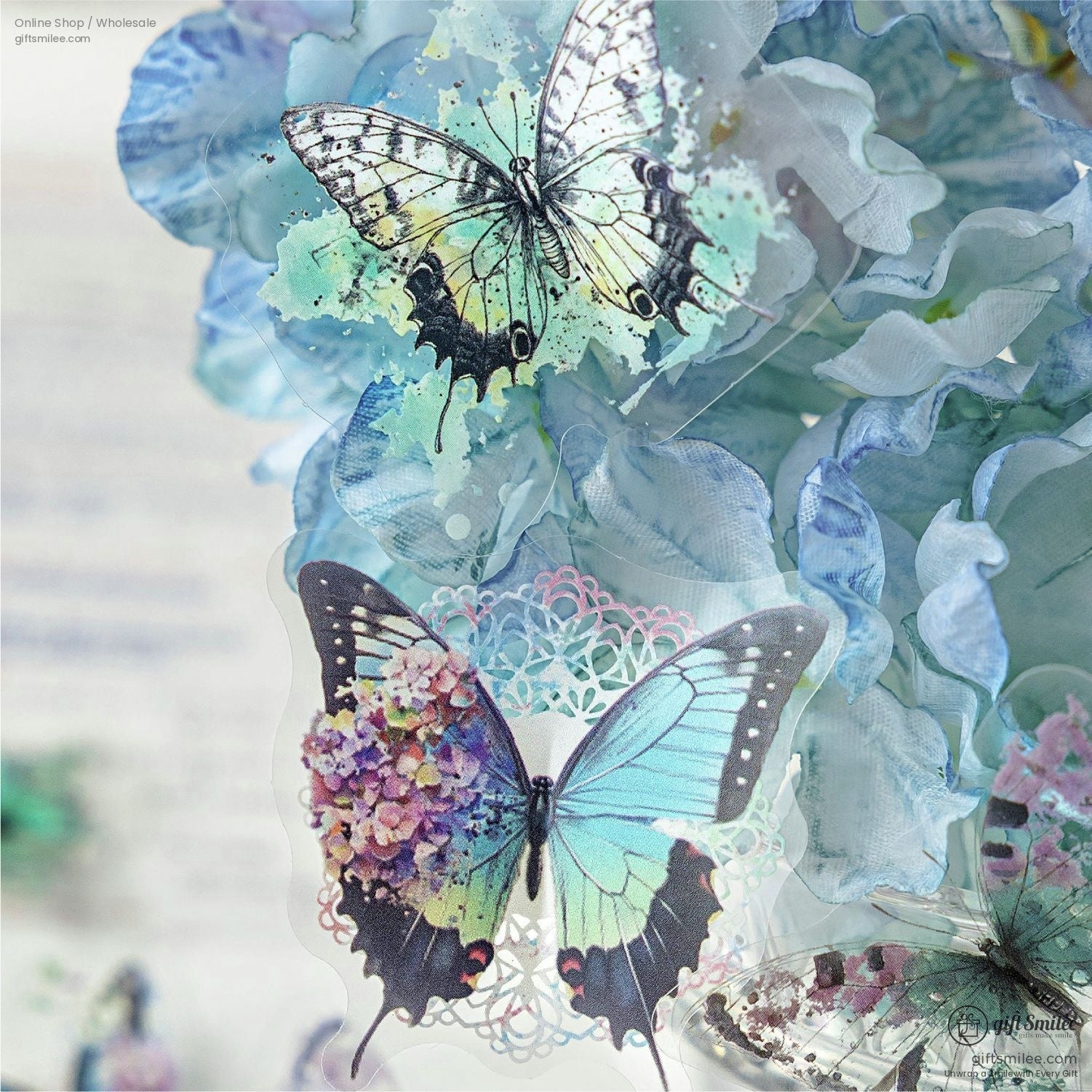 Close-up of delicate watercolor butterfly stickers on a pastel floral background