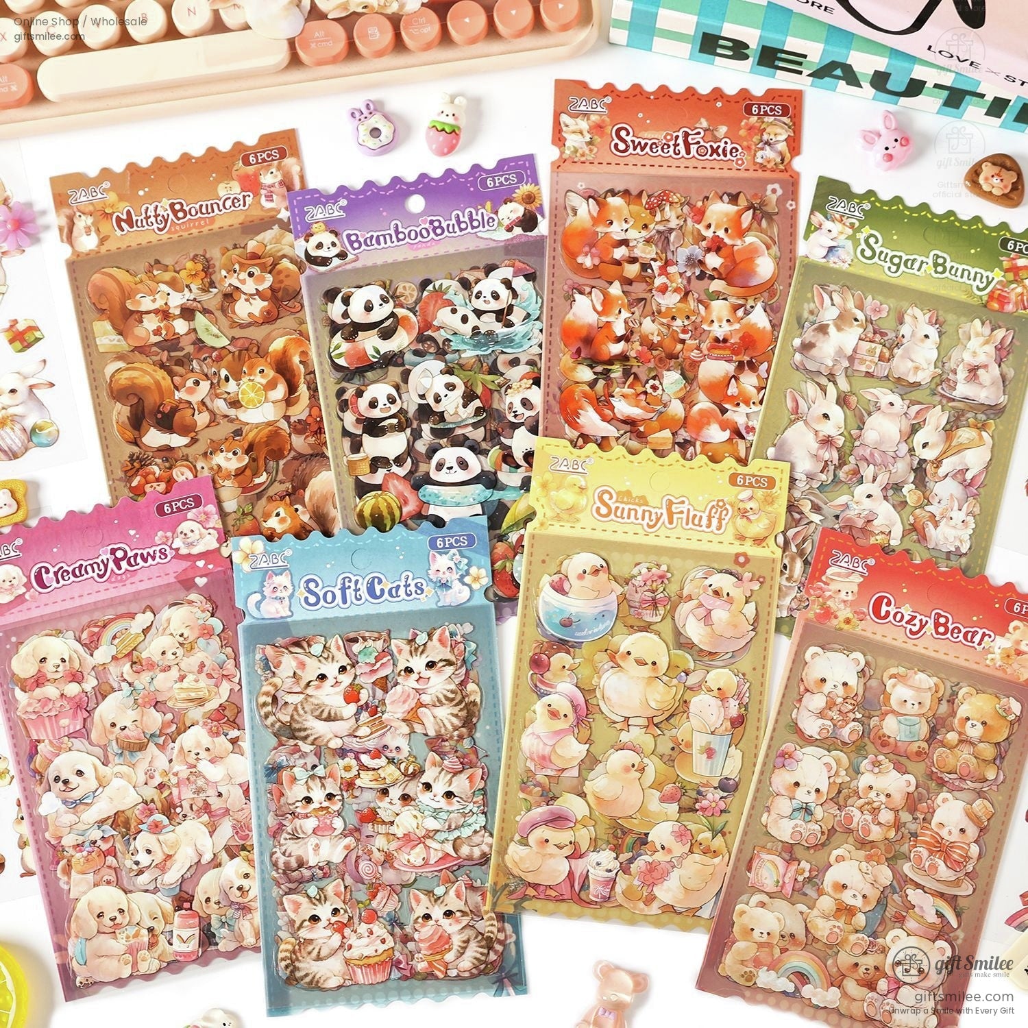 A collection of kawaii animal stickers featuring foxes, bunnies, pandas, bears, and cats in colorful packaging