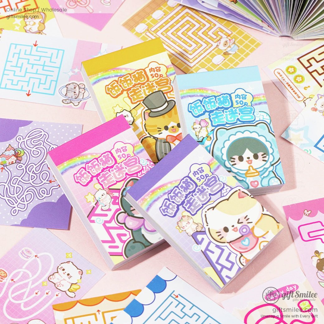 Four cat maze notepads with vibrant designs on a playful background.