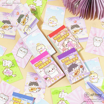 Close-up of colorful kawaii cat-themed mini memo pads with adorable designs.