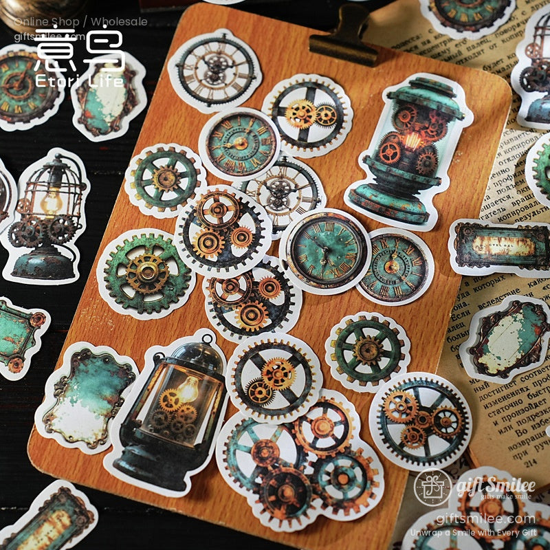 A close-up of vintage mechanical clock-themed stickers on a clipboard