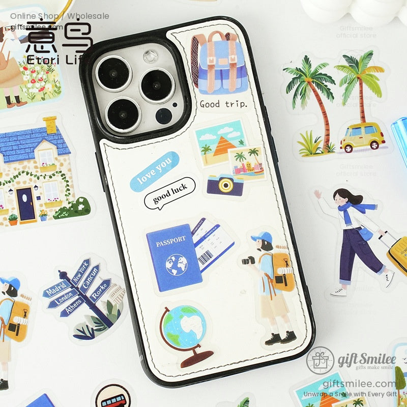 Travel-themed stickers with globes, passports, and suitcases on a phone case