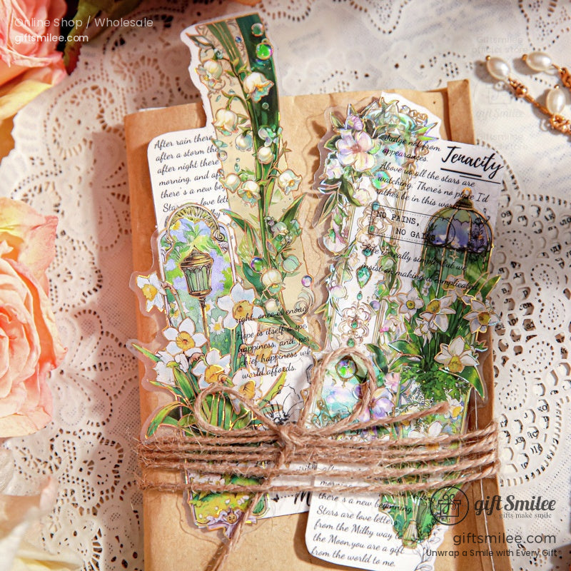 Packaged floral gold foil stickers with rustic brown wrapping and a delicate floral theme