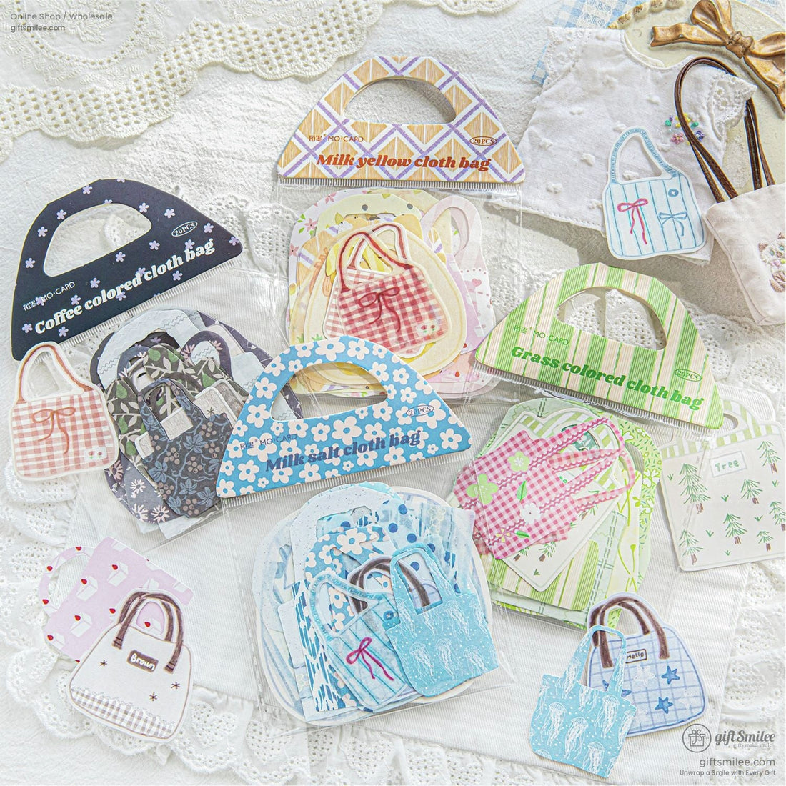 A collection of blue and white mini tote bag stickers with floral and striped patterns, perfect for journaling and scrapbooking