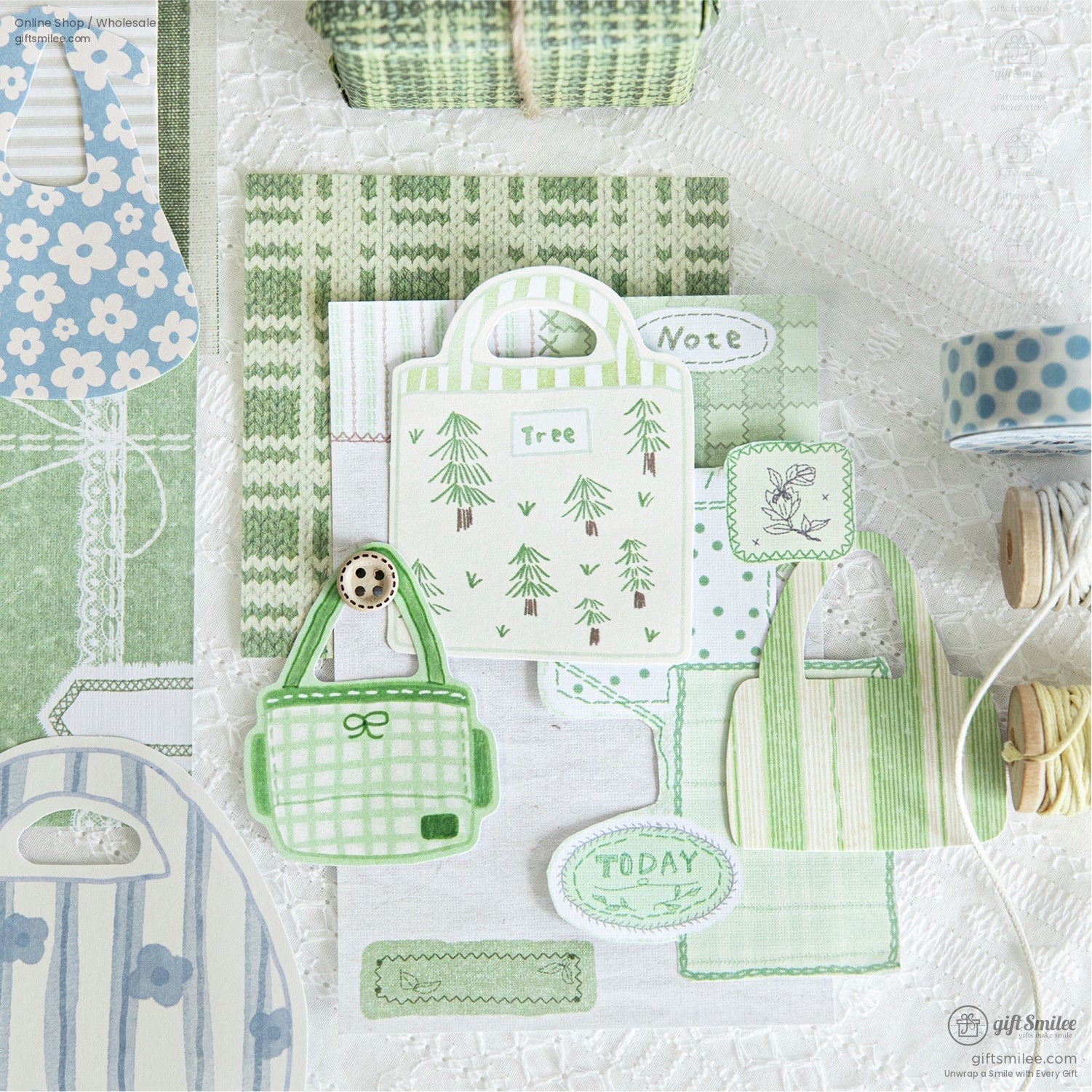 Green-themed mini tote bag stickers with trees and plaid designs, adding a refreshing touch to scrapbooking projects