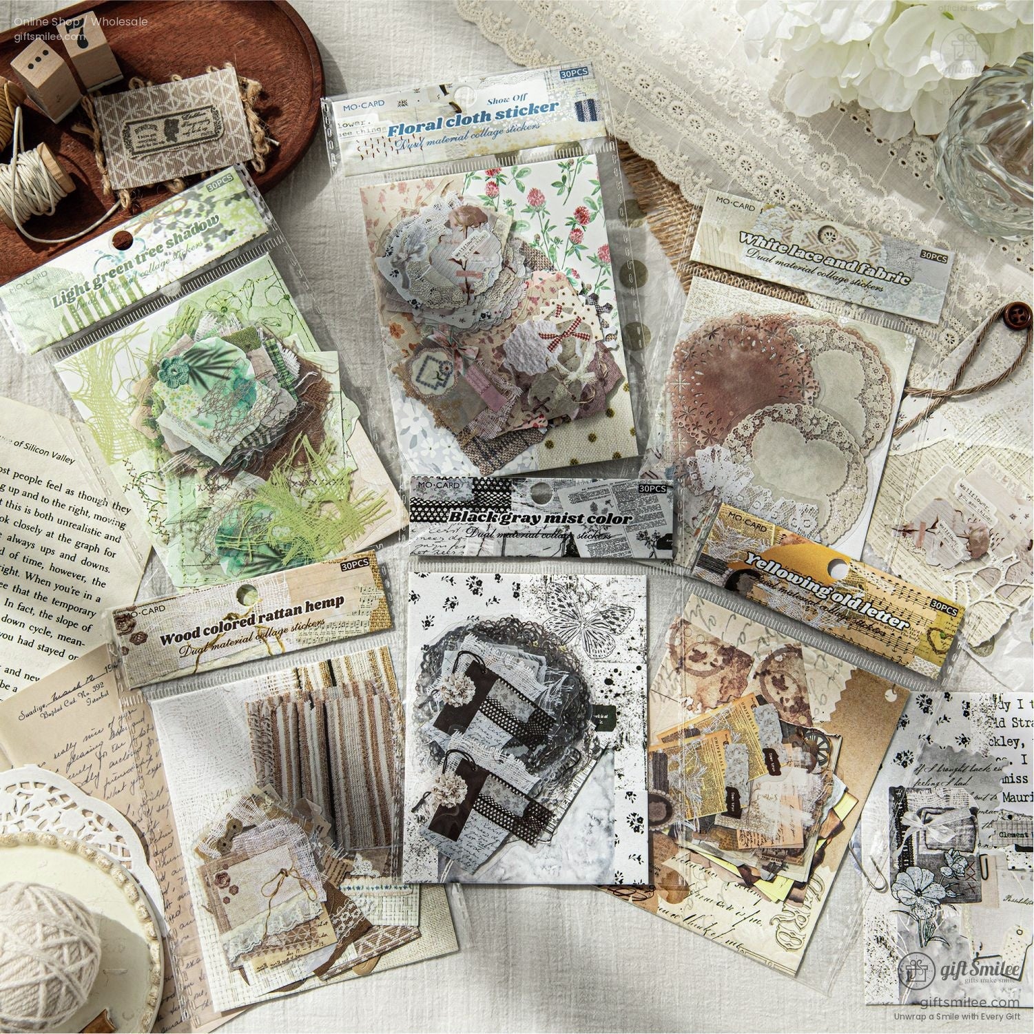 A variety of vintage scrapbook kits showcasing floral stickers, lace designs, and rattan hemp textures