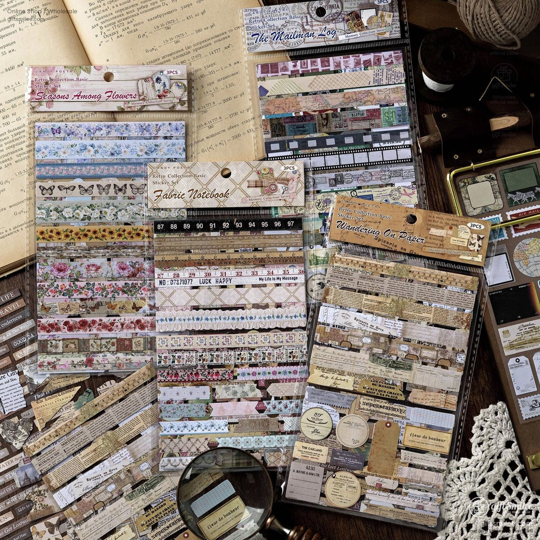 Close-up of retro scrapbooking stickers and ephemera paper strips on a wooden surface