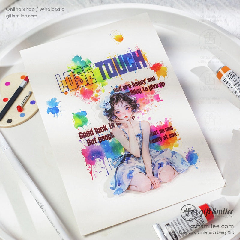 Watercolor-inspired sticker with a painting and Lose Touch quote on a white tray