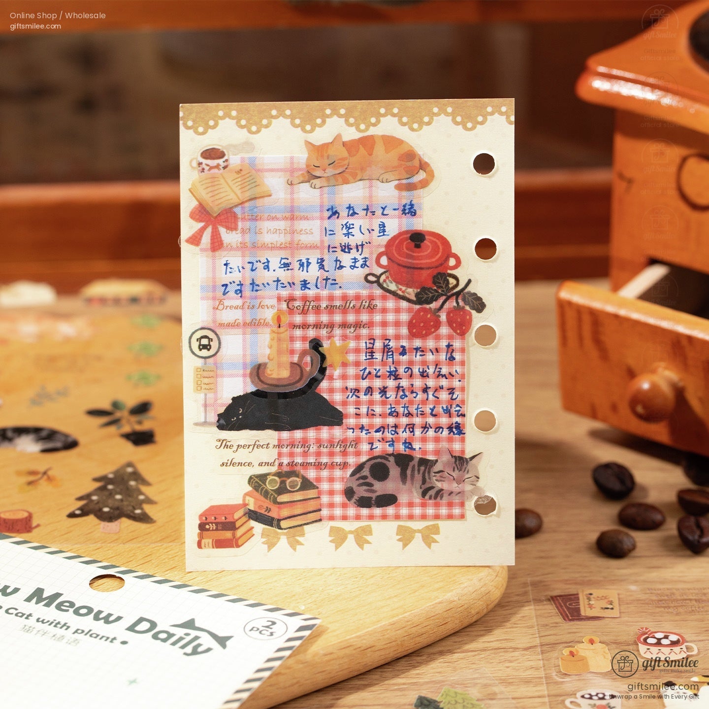 Vintage-style journal page with cats, strawberries, and coffee-inspired stickers