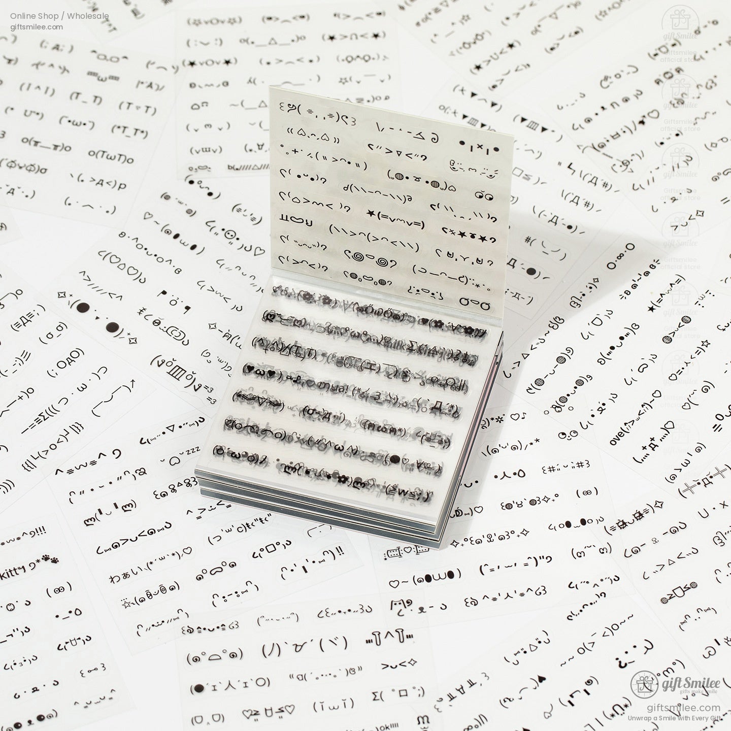 Black-and-white emoji stickers with various cute and expressive faces