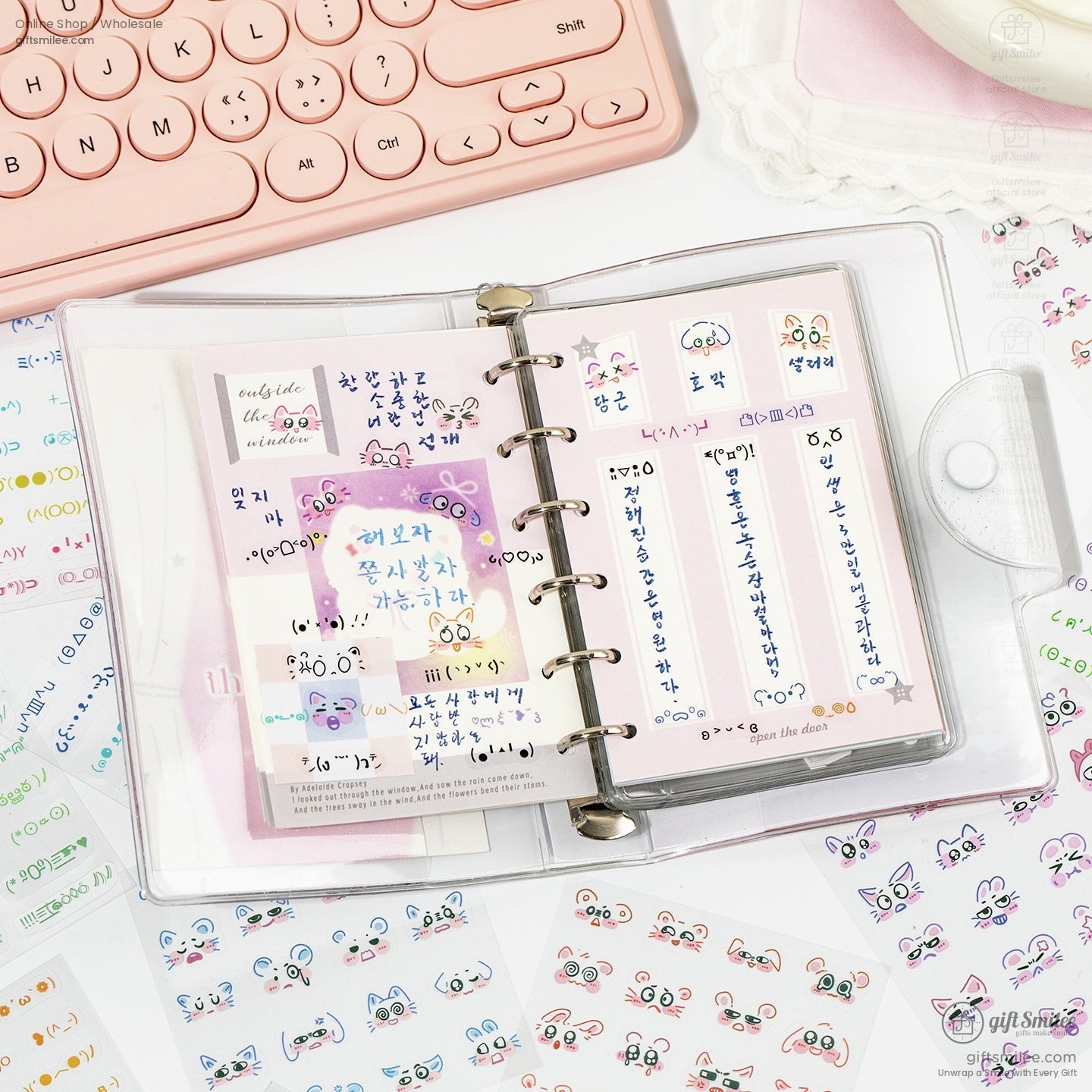 Kawaii journal decorated with colorful emoji stickers and creative layouts