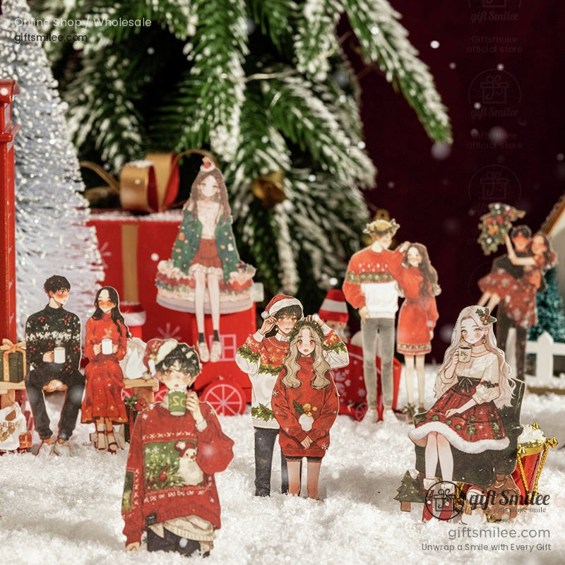 Festive sticker set of romantic couples and Christmas scenes surrounded by snowy trees and lights