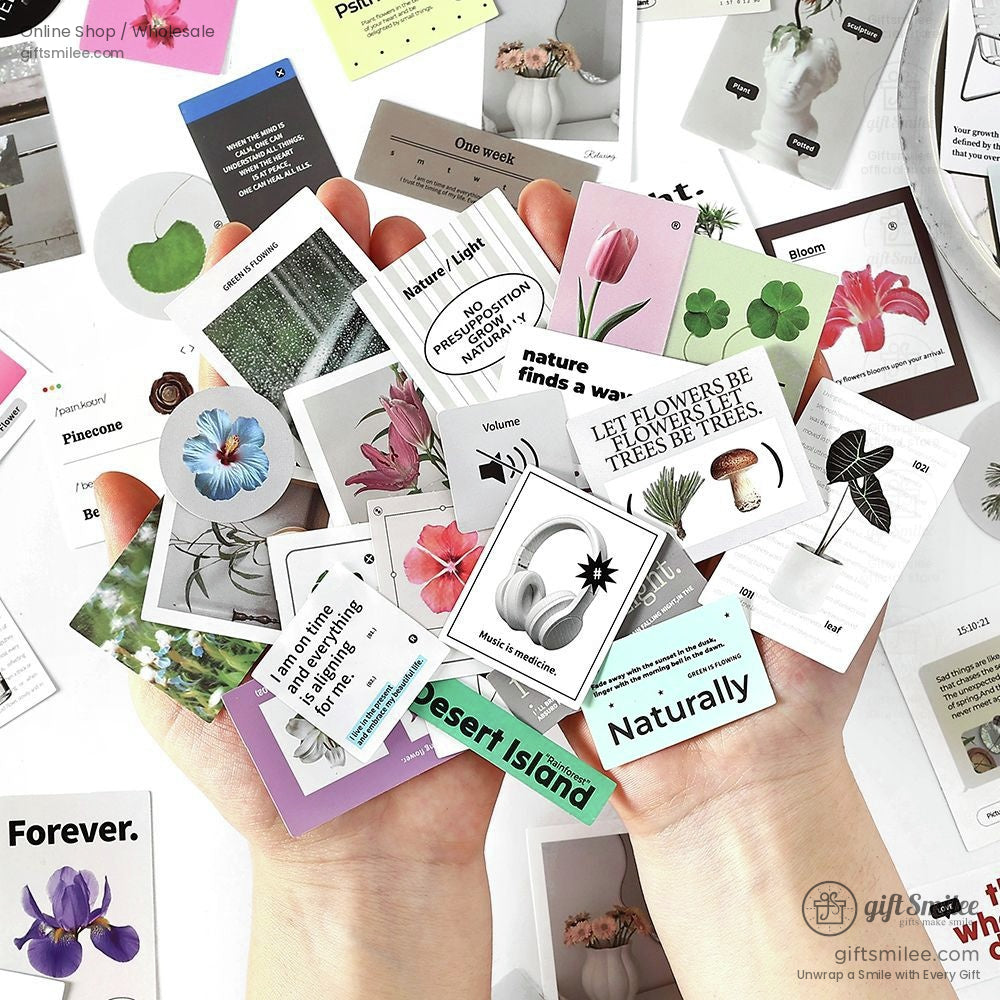 Hands holding botanical and floral aesthetic stickers, featuring flowers, plants, and motivational quotes