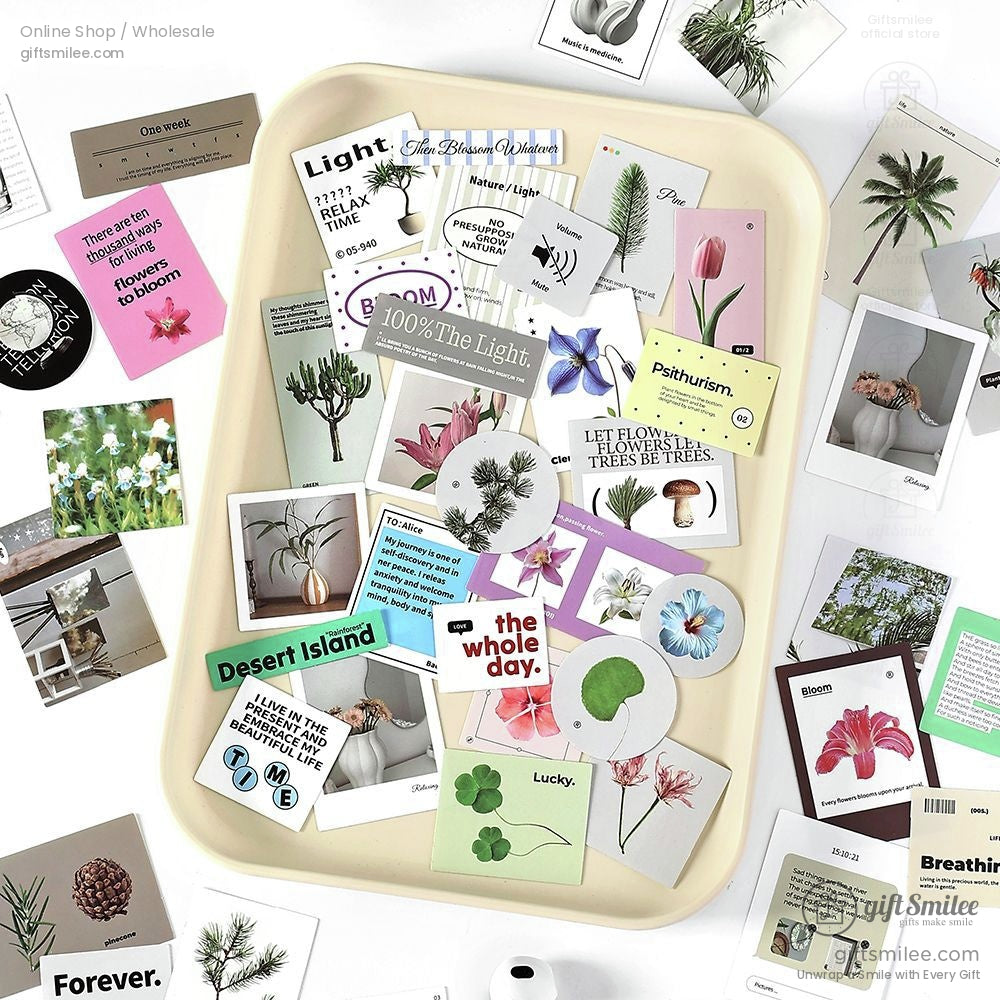 A tray of nature-inspired stickers, showcasing greenery, flowers, and minimalist designs for crafts