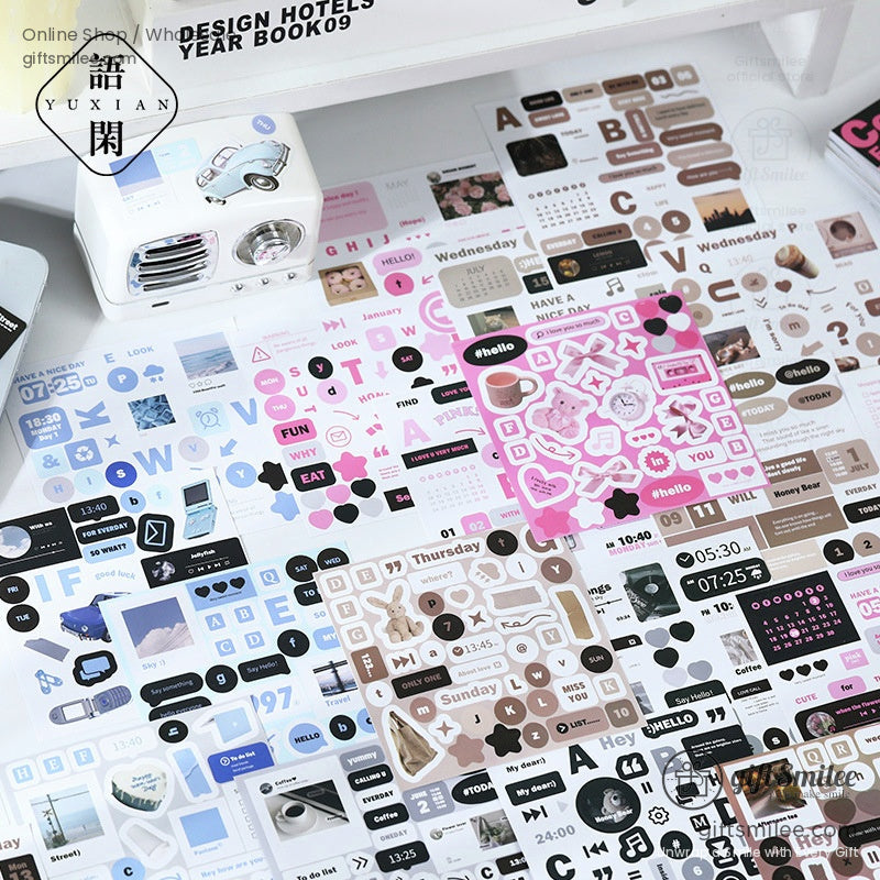 Close-up of colorful journaling stickers spread out with playful and aesthetic designs