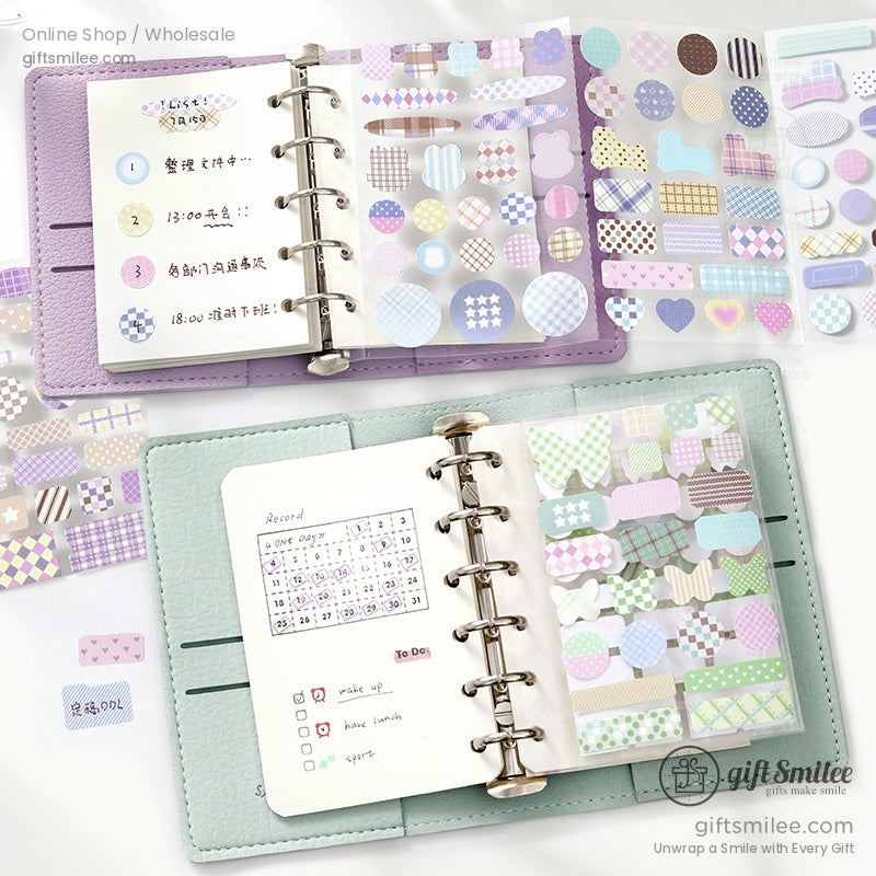 Pastel journal setup featuring planner pages and colorful decorative stickers