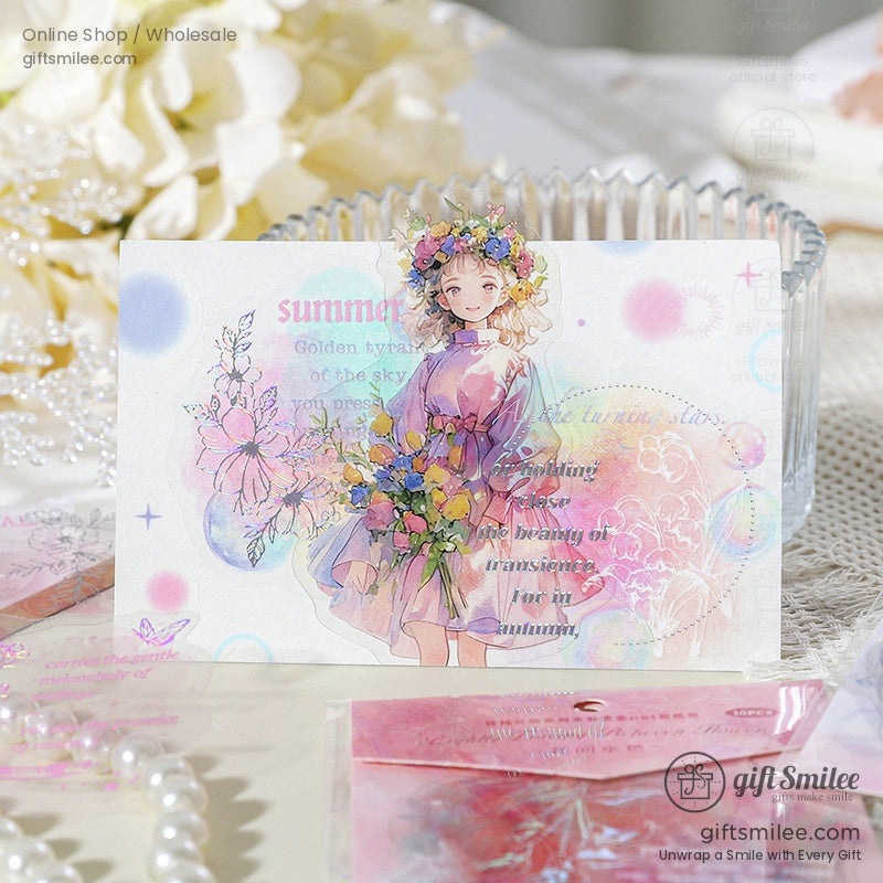 A close-up of a pastel aesthetic postcard with a girl holding flowers, surrounded by delicate floral ephemera