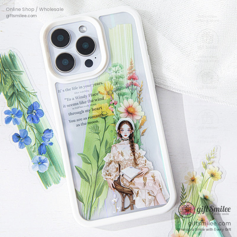 A phone case customized with watercolor floral stickers and artistic details