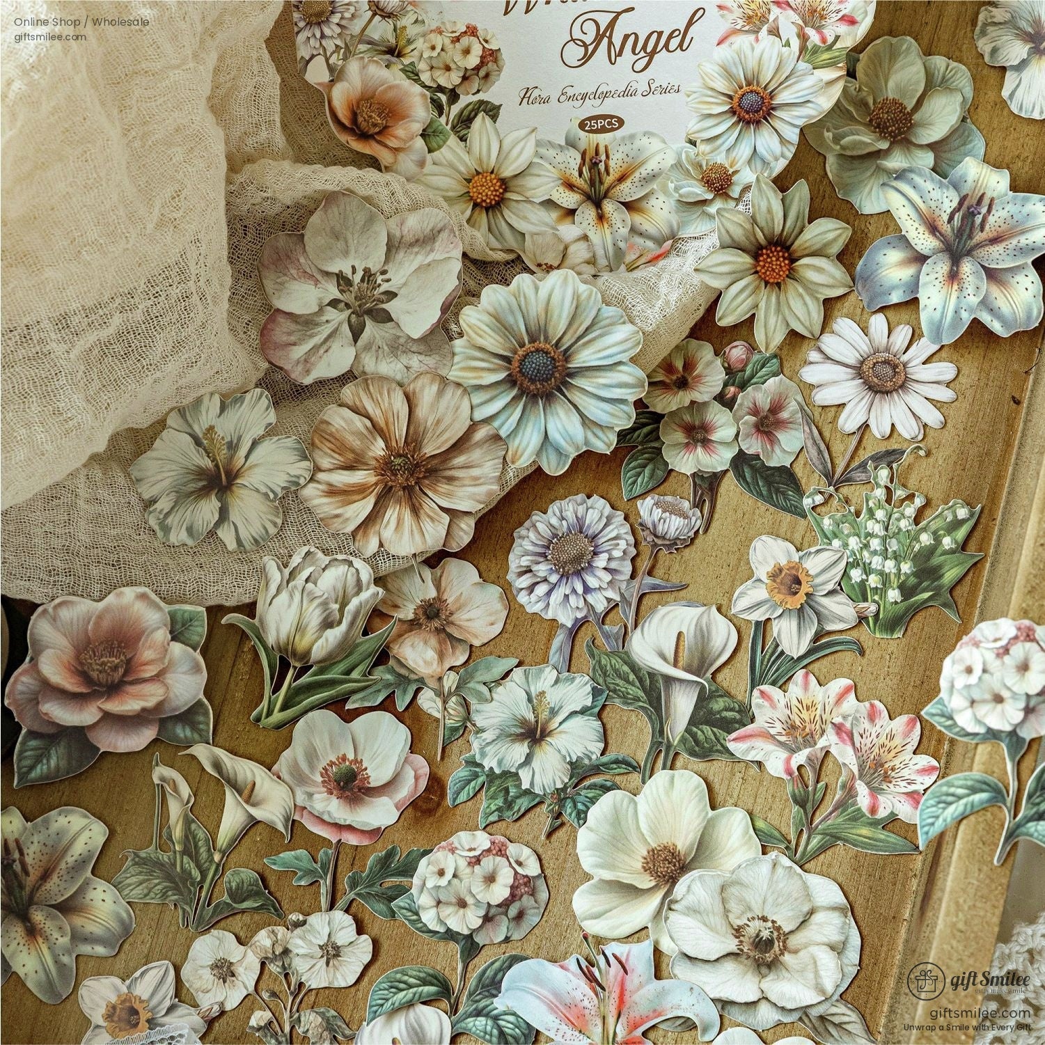 Vintage floral stickers with soft pastel hues on a wooden background