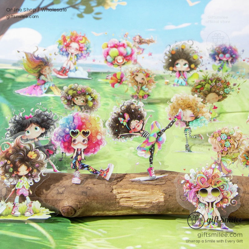 Colorful stickers featuring playful cartoon girls with rainbow hair and dynamic poses in a bright meadow
