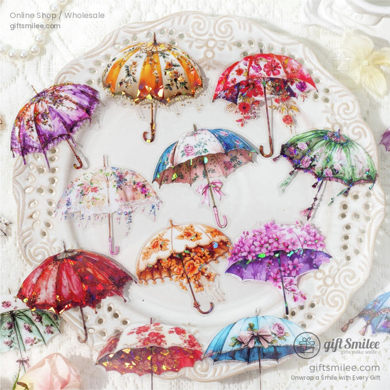 Assorted floral umbrella stickers with intricate patterns on a decorative plate