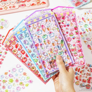 A vibrant set of 3D relief stickers featuring fruit, desserts, and kawaii animals held in hand
