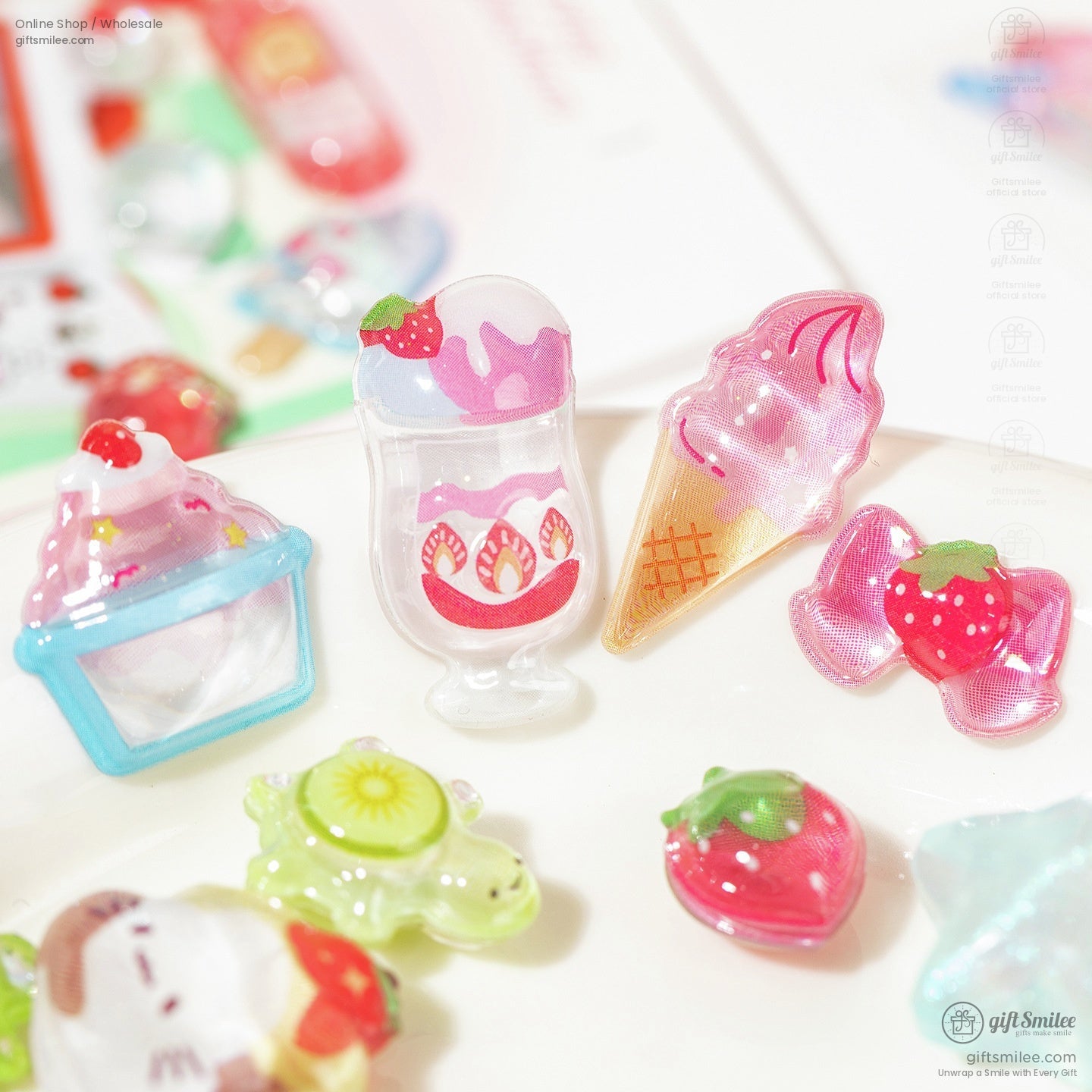 A selection of strawberry and dessert-themed stickers, including ice cream and candy designs