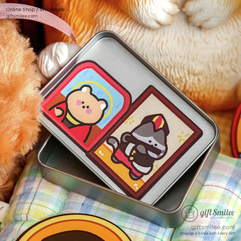 Small tin box featuring animal portrait stickers in vibrant cosplay themes