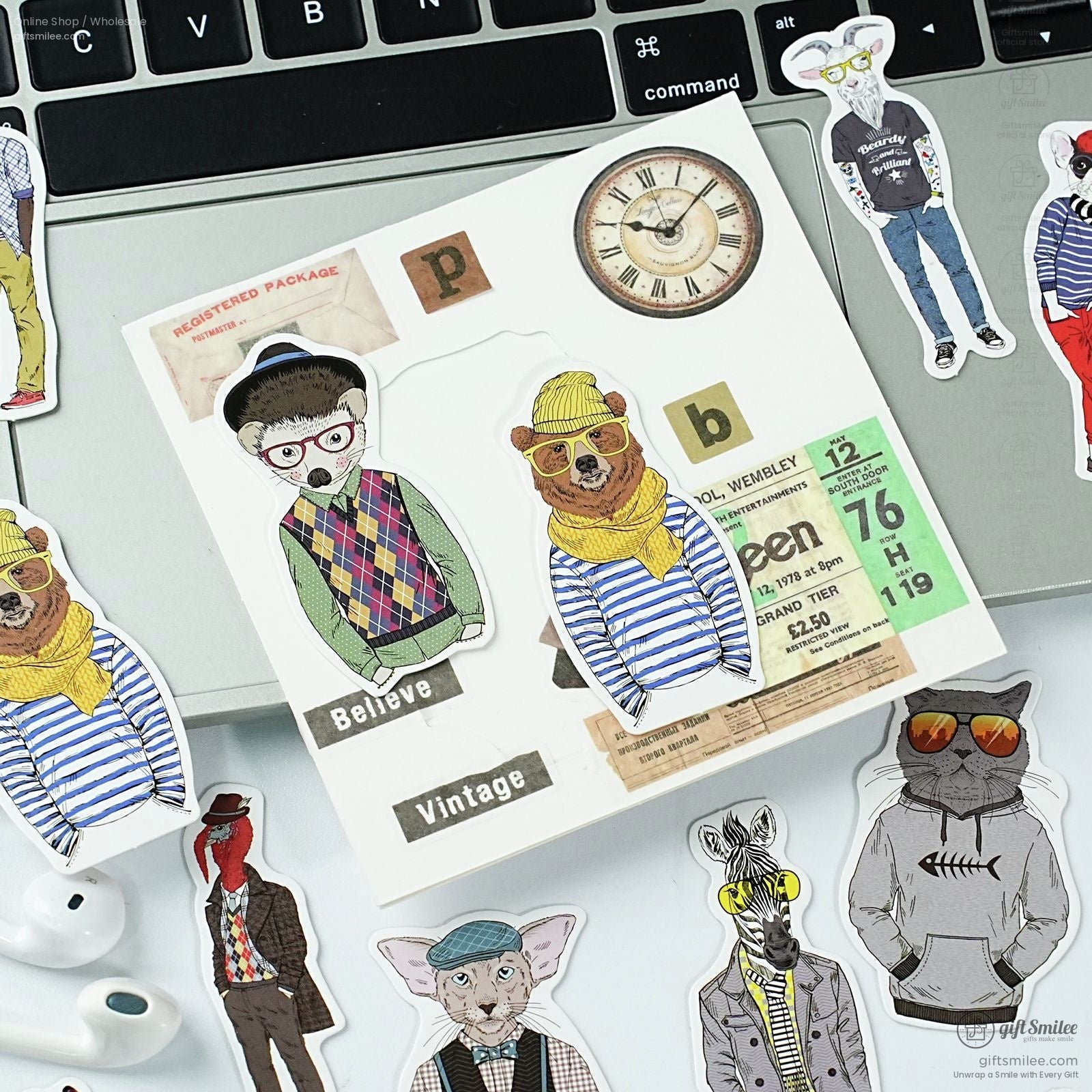 Animal character stickers with vintage vibes on a laptop, surrounded by creative elements