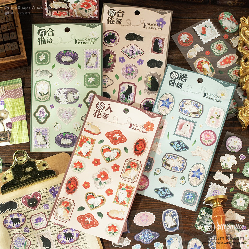 Four sets of decorative cat and flower stickers in various colors, ideal for planners and scrapbooking projects