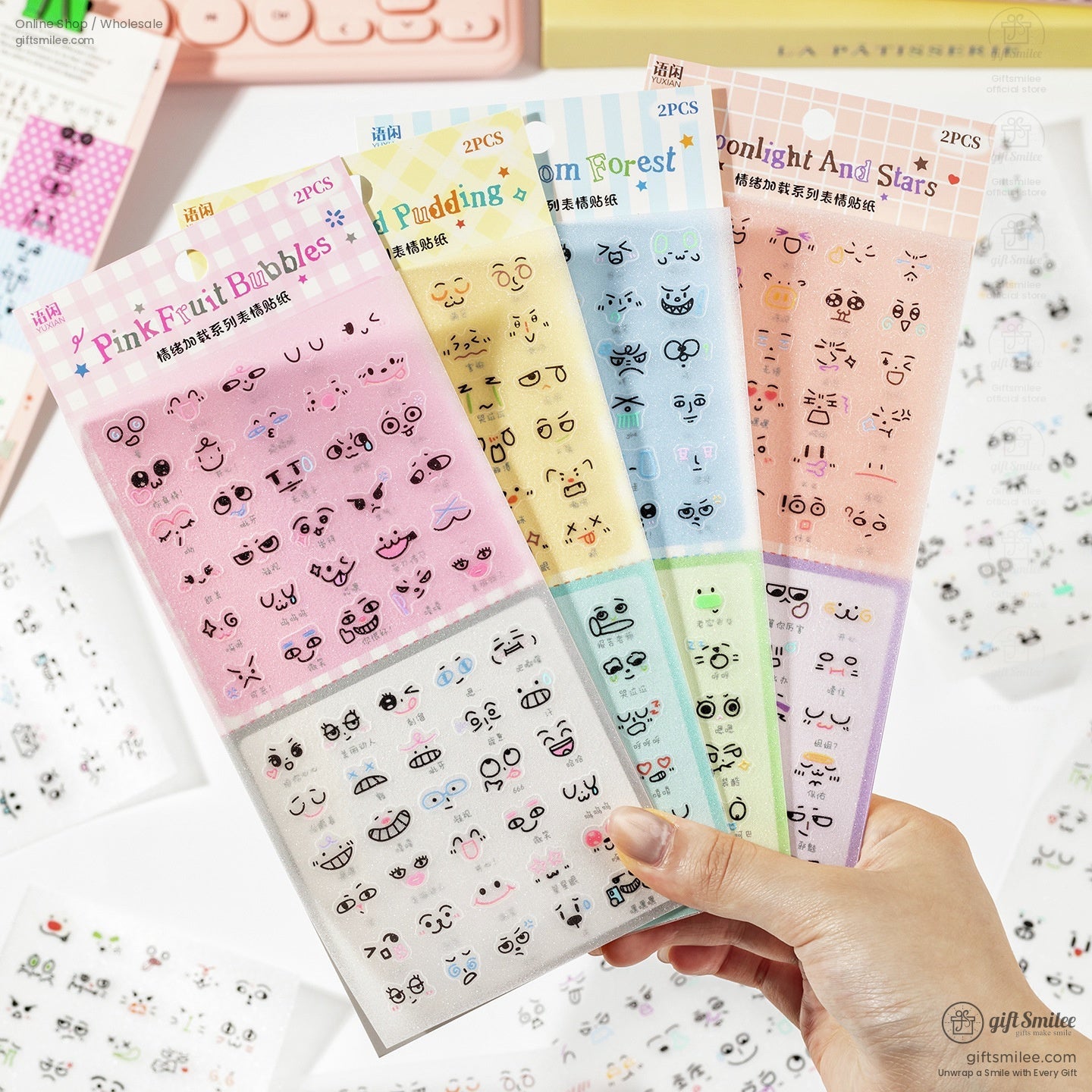 Close-up of pink and pastel anime face expression stickers with cute designs