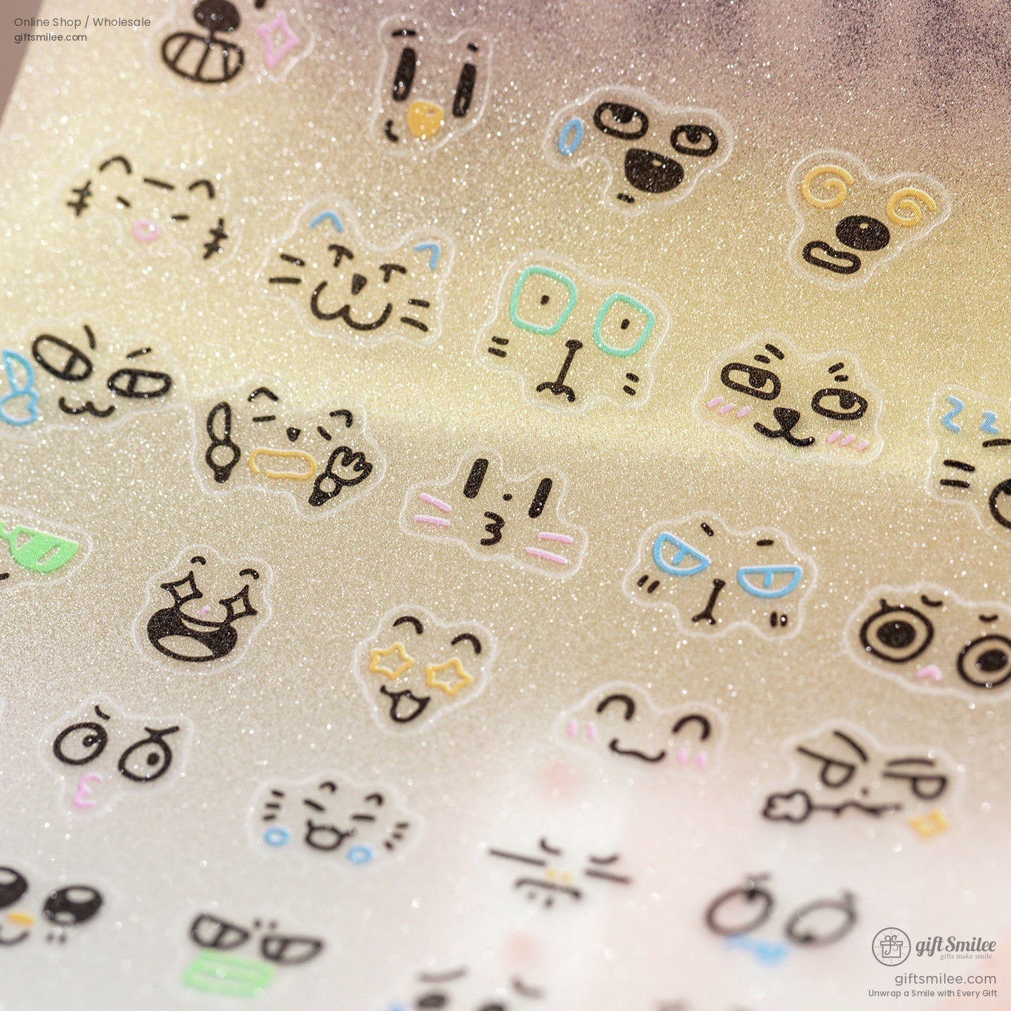Detailed view of glossy stickers featuring playful and emotional anime faces