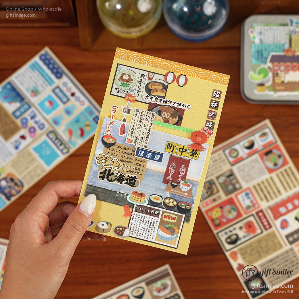 Individual Japanese retro food sticker sheet held in hand with intricate designs